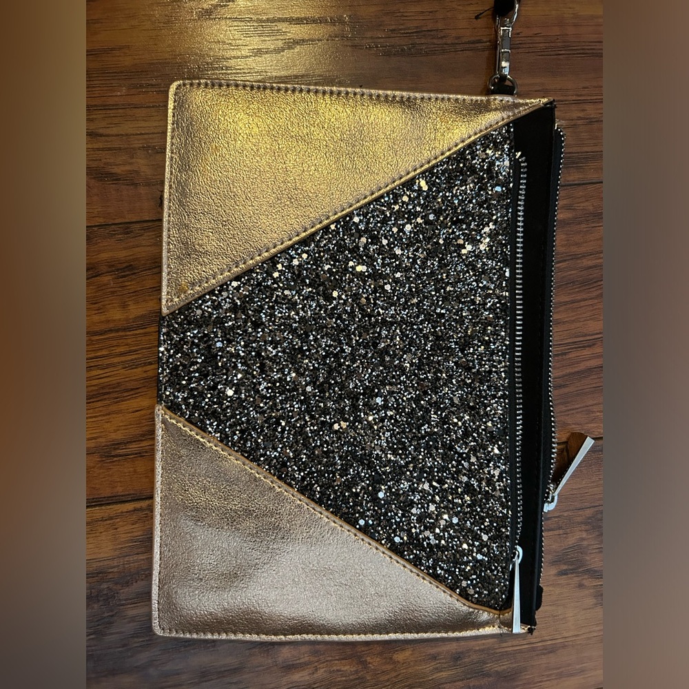 Glitter Envelope wristlet clutch from Express. Black and gold. Gently used